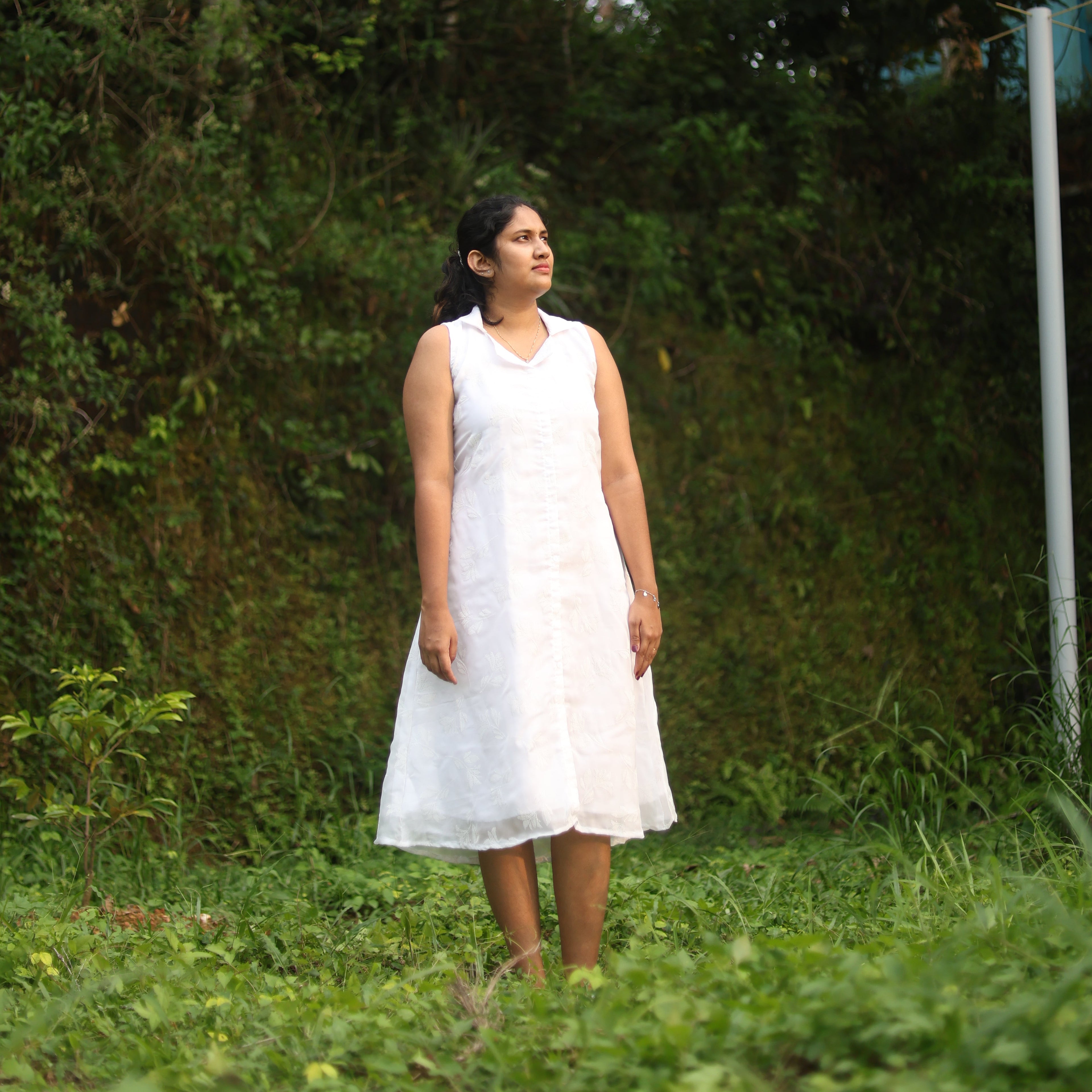 Shimmering White A-Line Dress with Shirt Pattern.