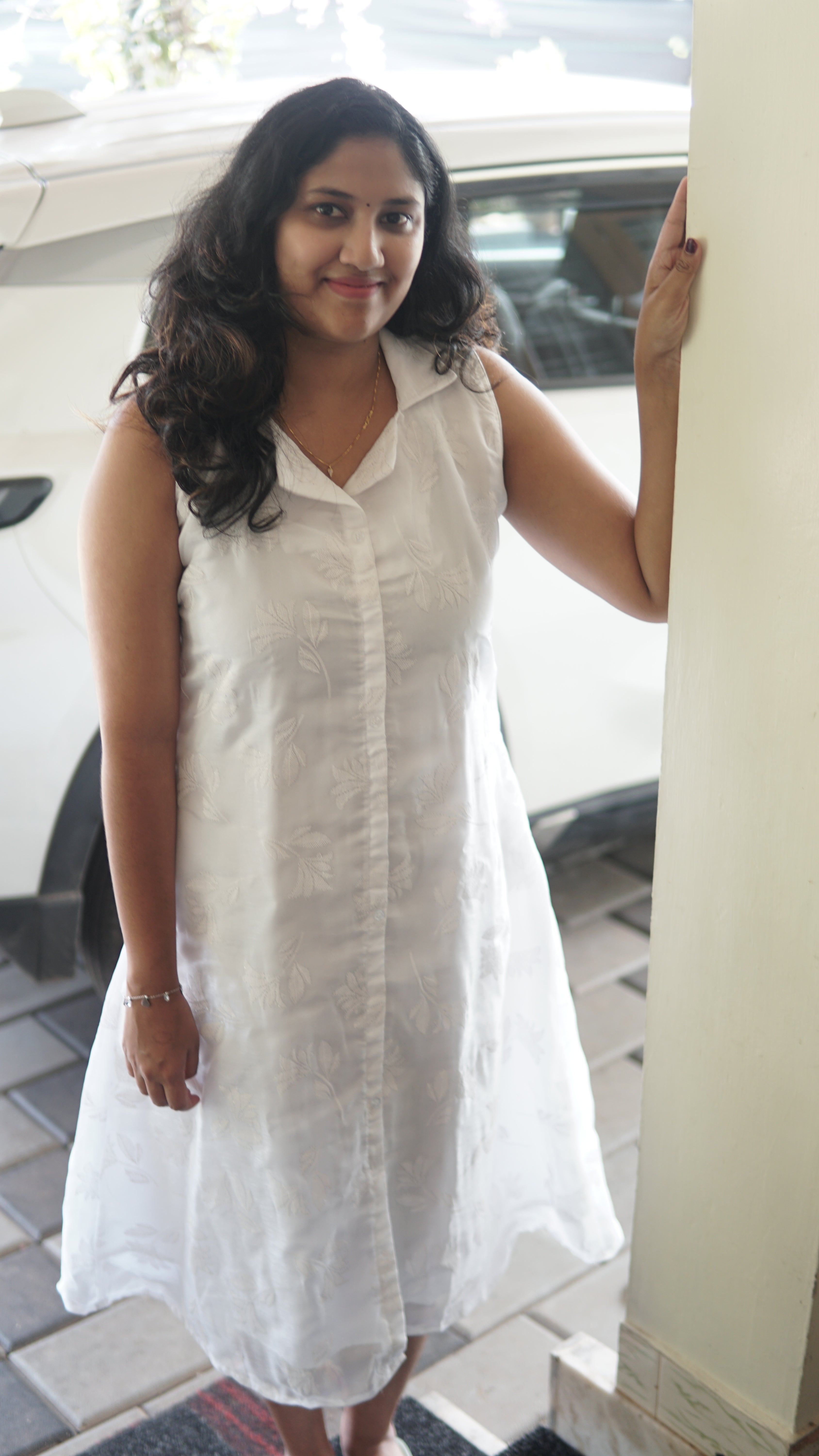 Shimmering White A-Line Dress with Shirt Pattern.