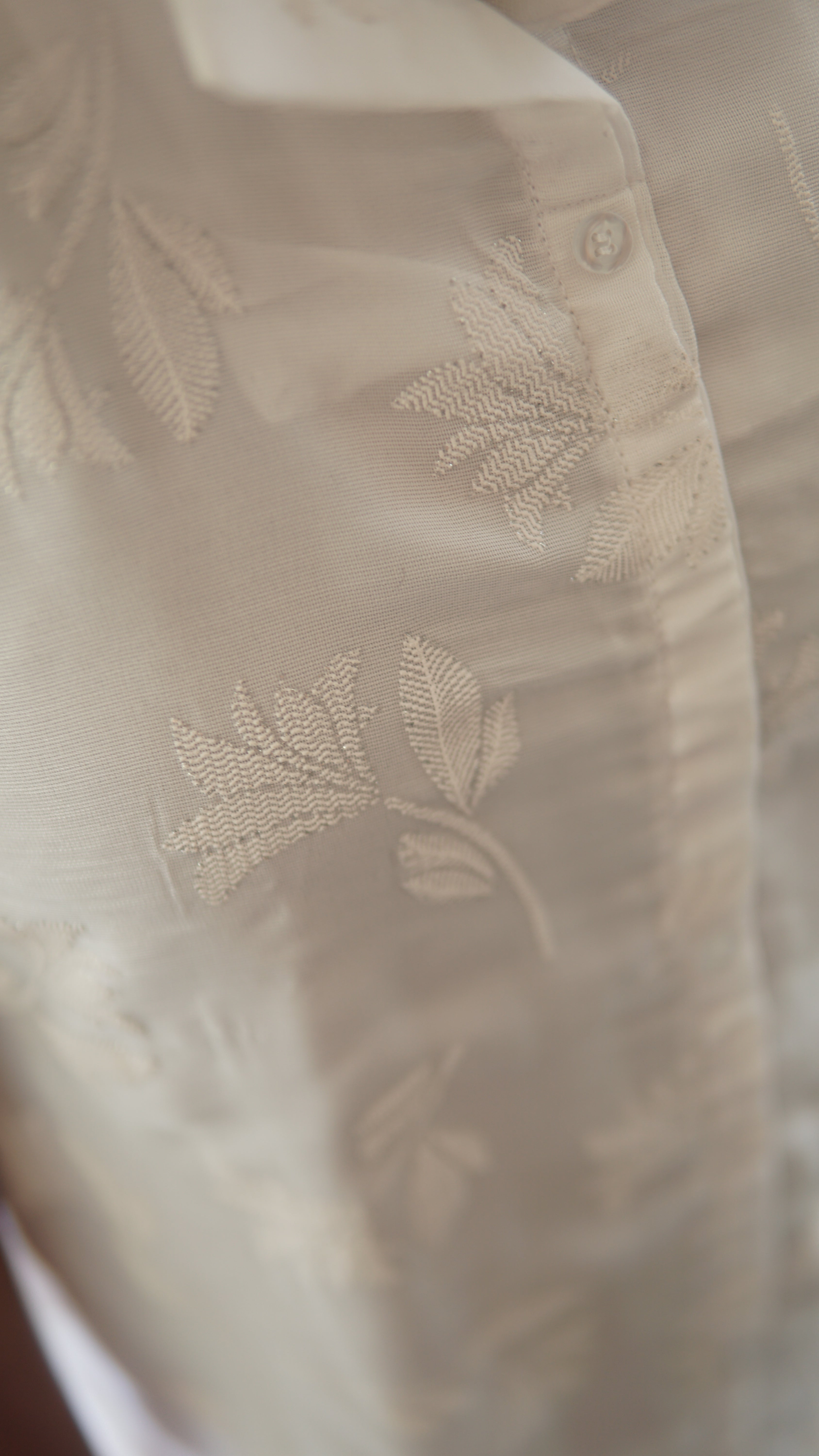 Shimmering White A-Line Dress with Shirt Pattern.