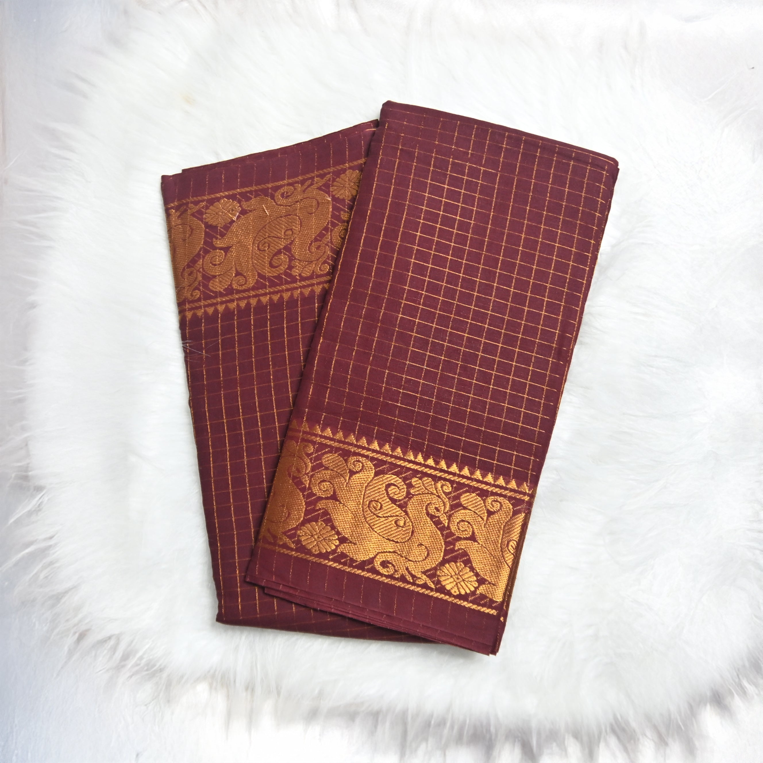 Checked Sungudi saree.