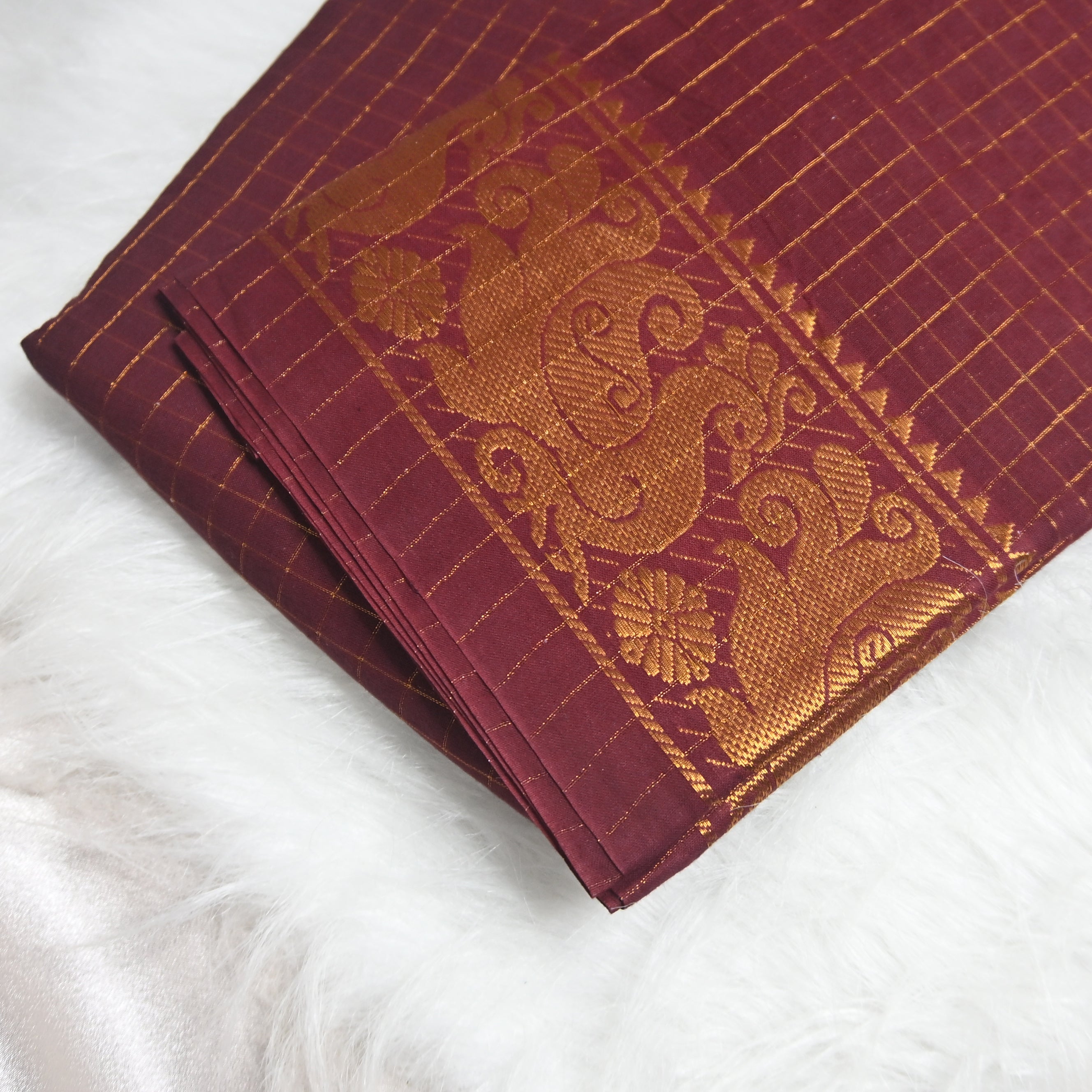 Checked Sungudi saree.