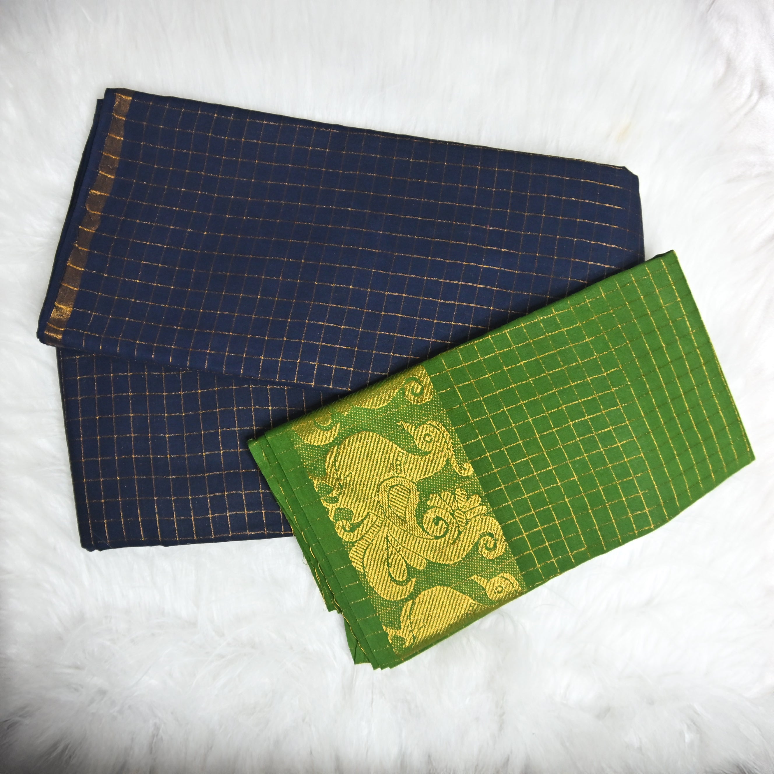 Pentex Madurai Sungudi saree in a green and blue combination.