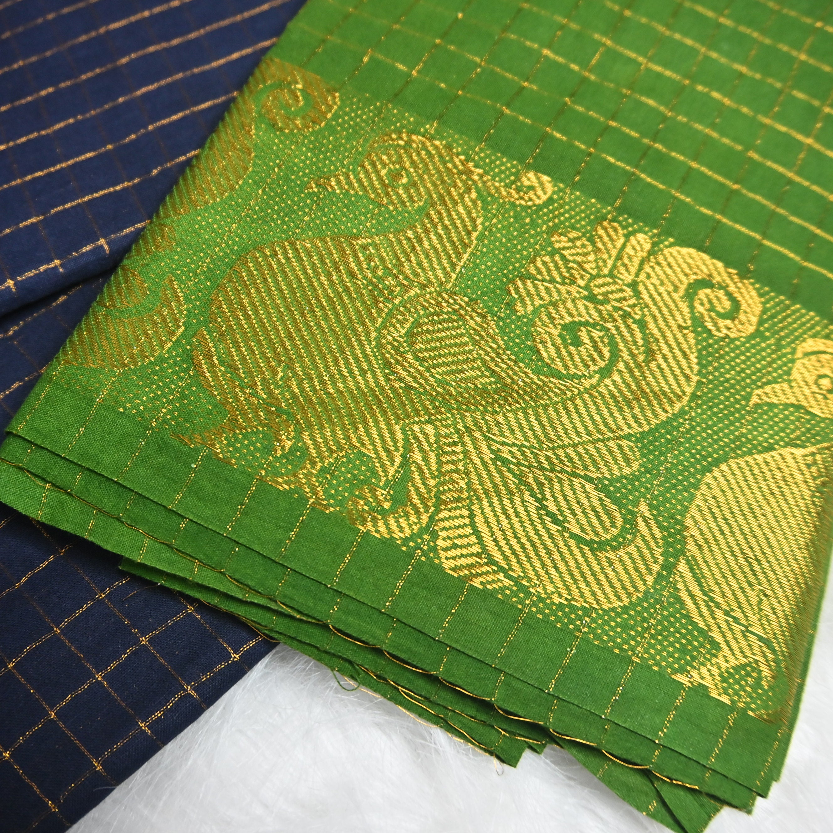 Pentex Madurai Sungudi saree in a green and blue combination.