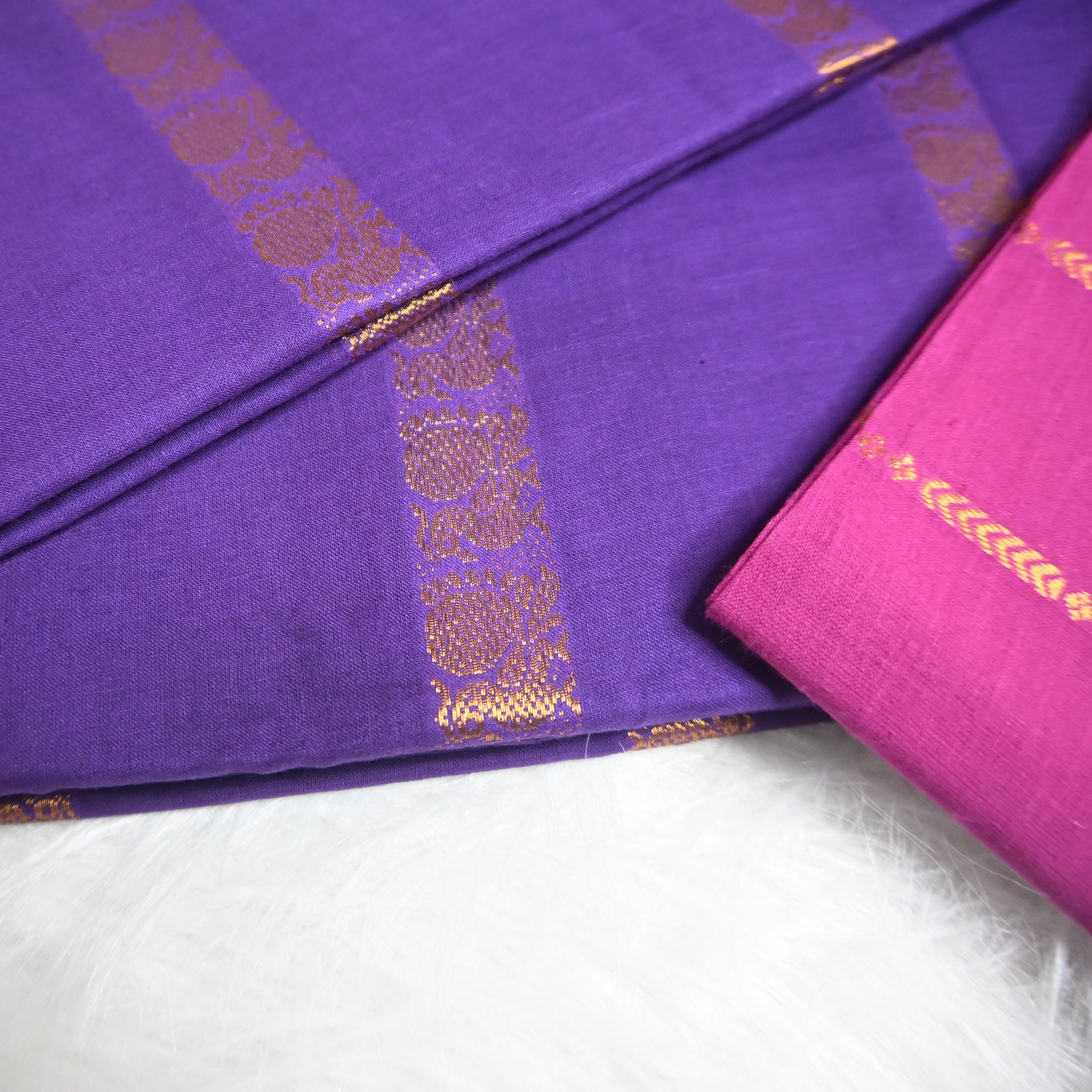 Violet and pink Velthari Madurai Sungudi cotton saree.