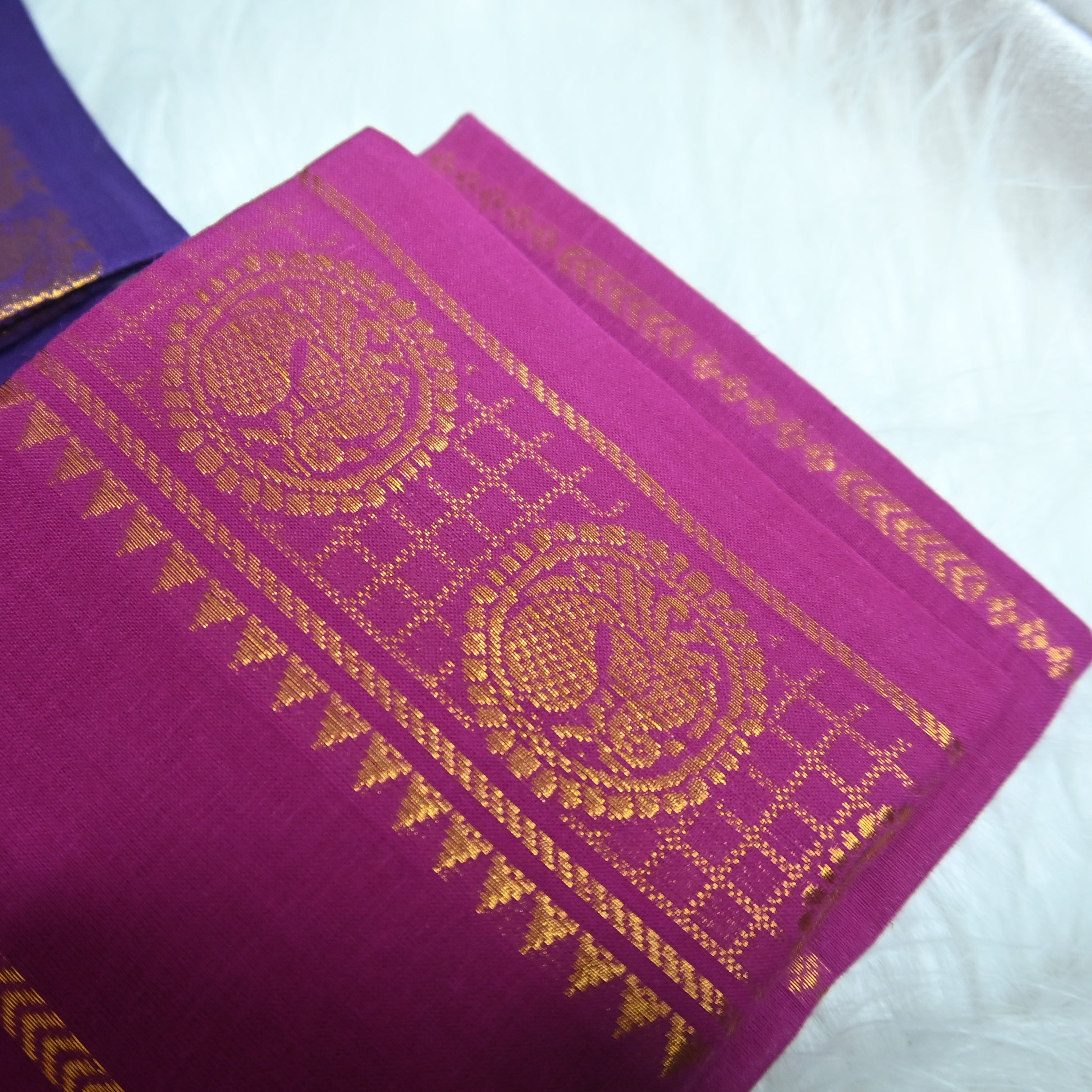 Violet and pink Velthari Madurai Sungudi cotton saree.
